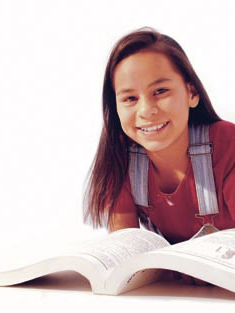 Photo of a girl reading a book.