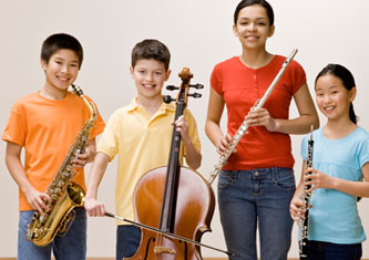 Students holding musical instruments