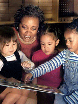 woman reading to kids