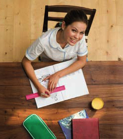 photo of a girl working at a desk